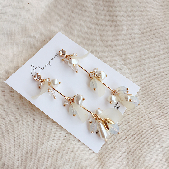 Two kinds of freshwater pearl drop earrings unspok