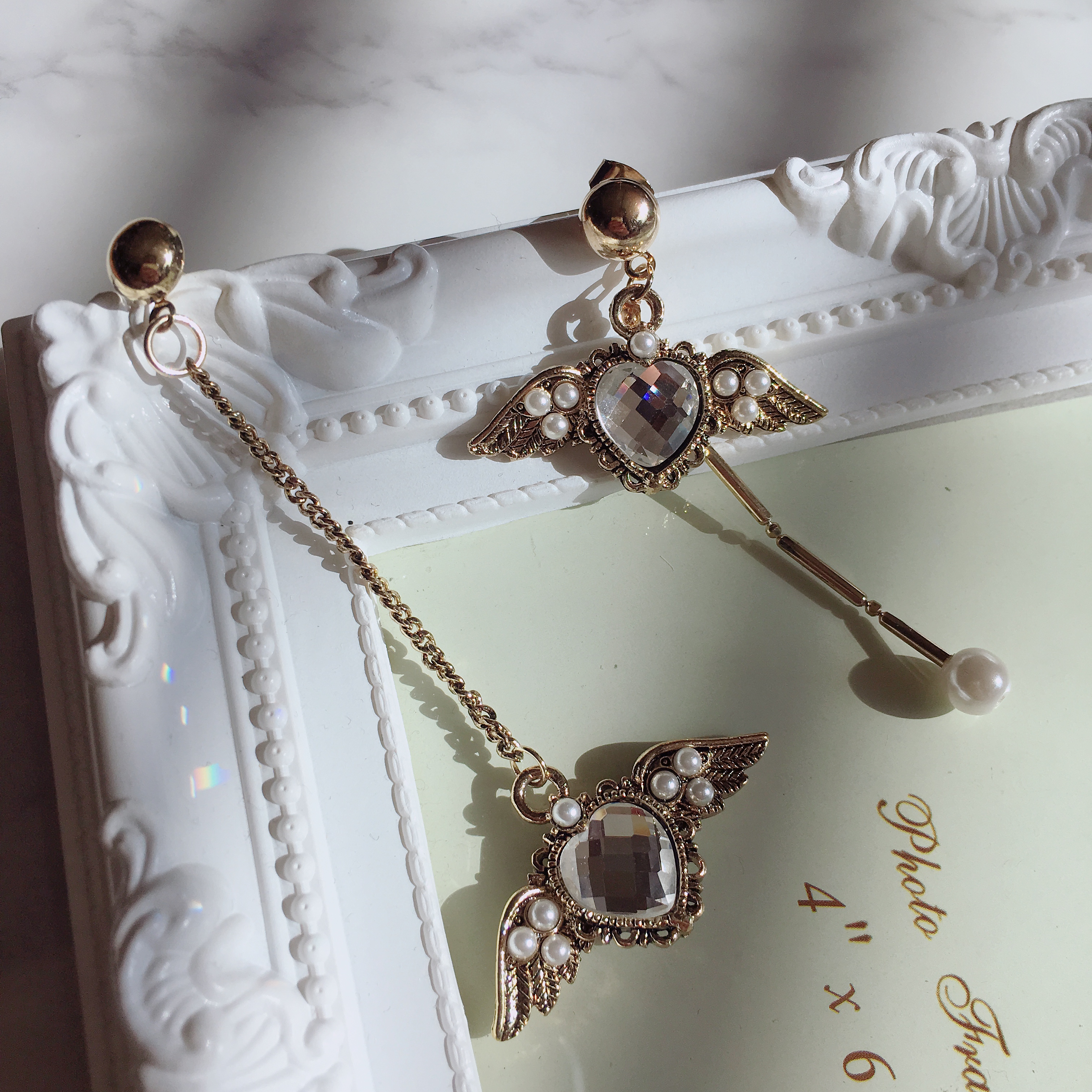 Antique and Lovely Heart Wing Uncut Drop Earring E