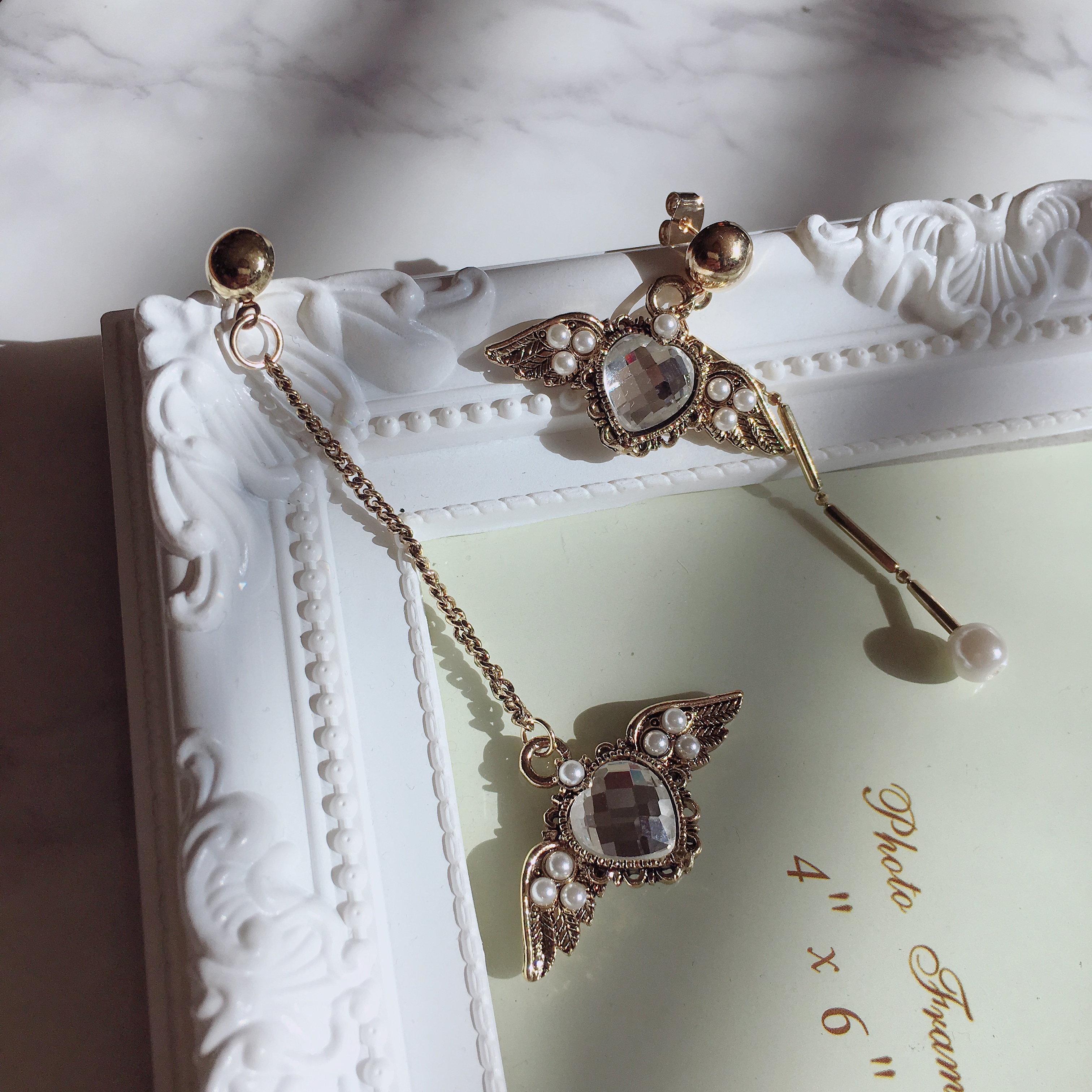 Antique and Lovely Heart Wing Uncut Drop Earring E