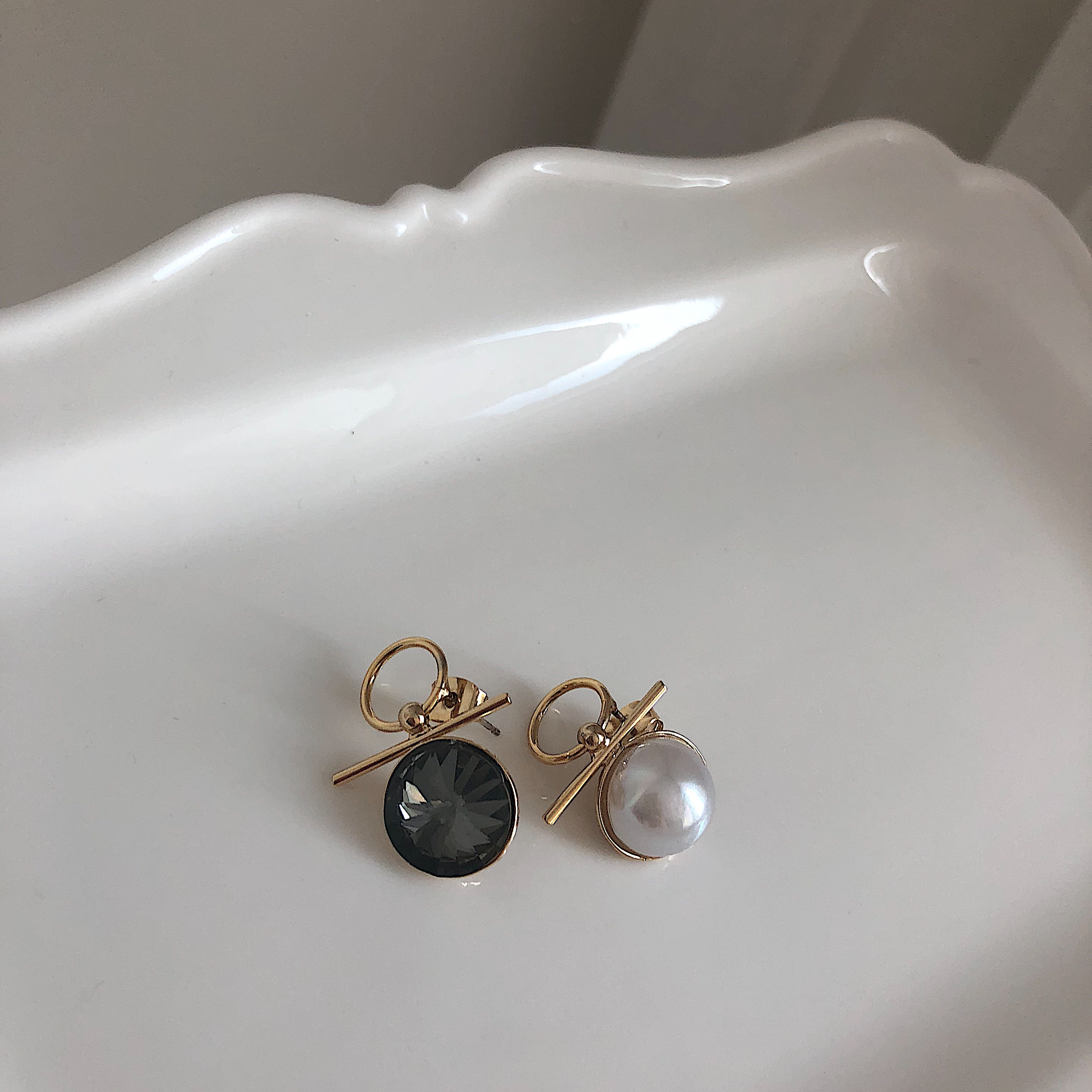 mood mud unbalanced earrings bold gold silver pear