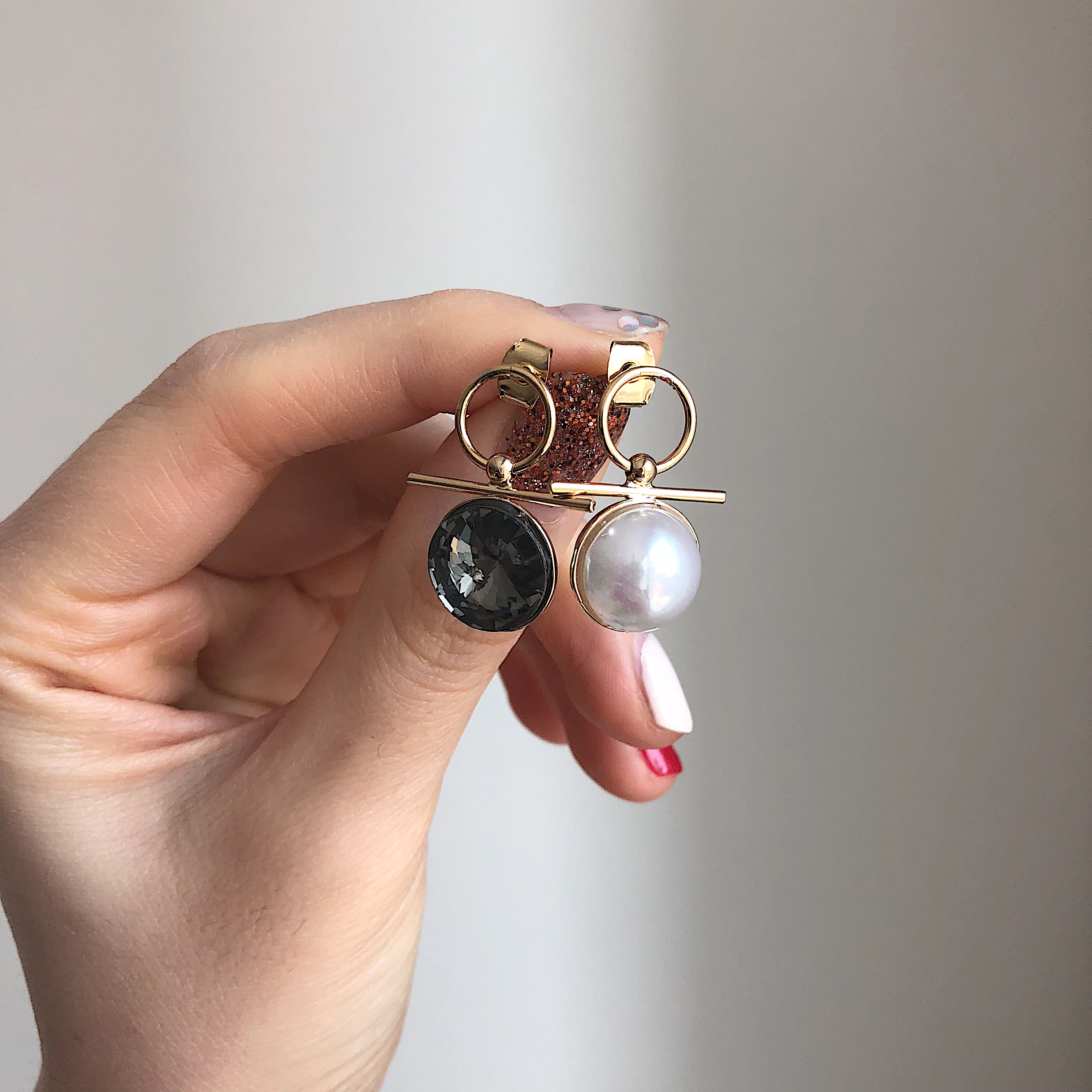 mood mud unbalanced earrings bold gold silver pear