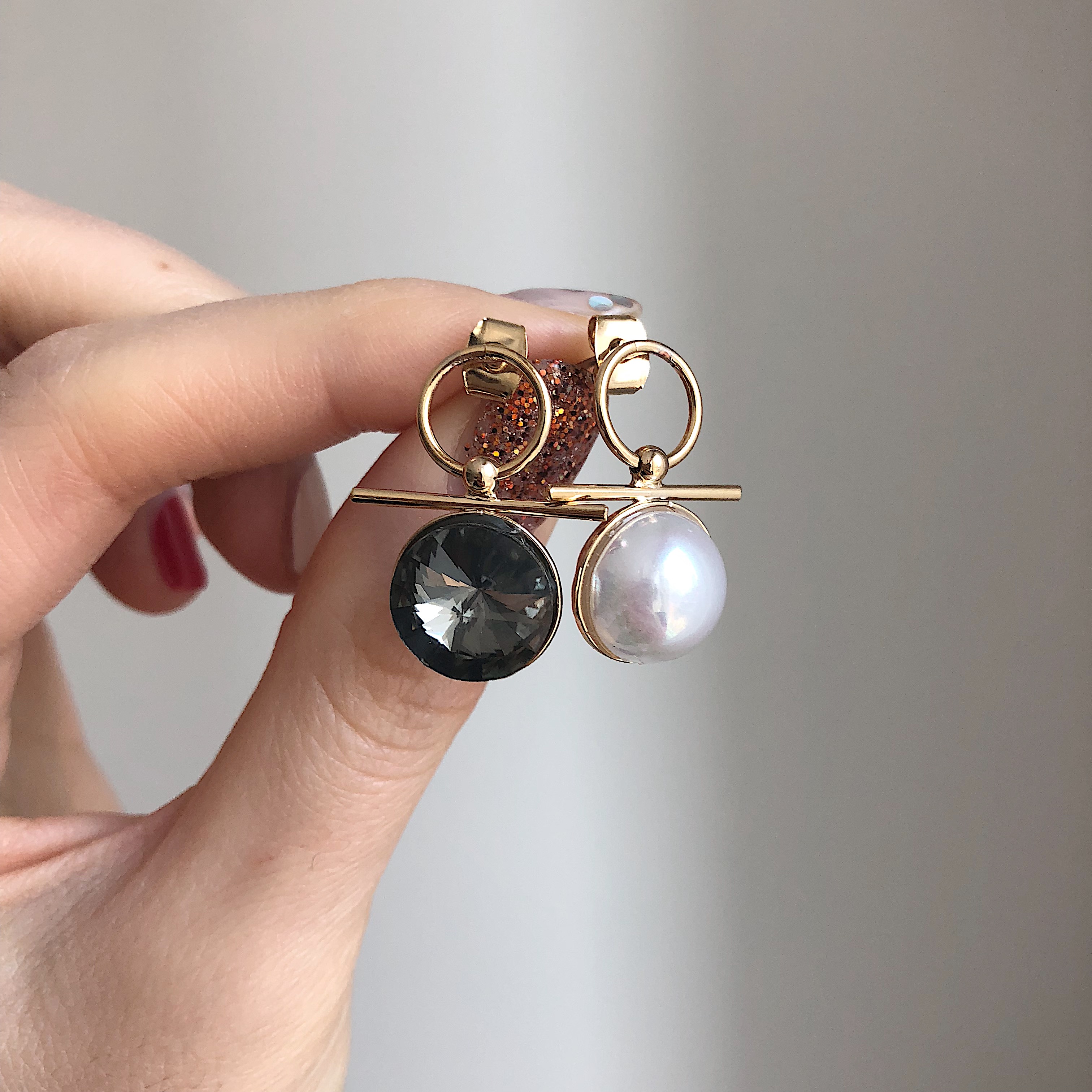 mood mud unbalanced earrings bold gold silver pear