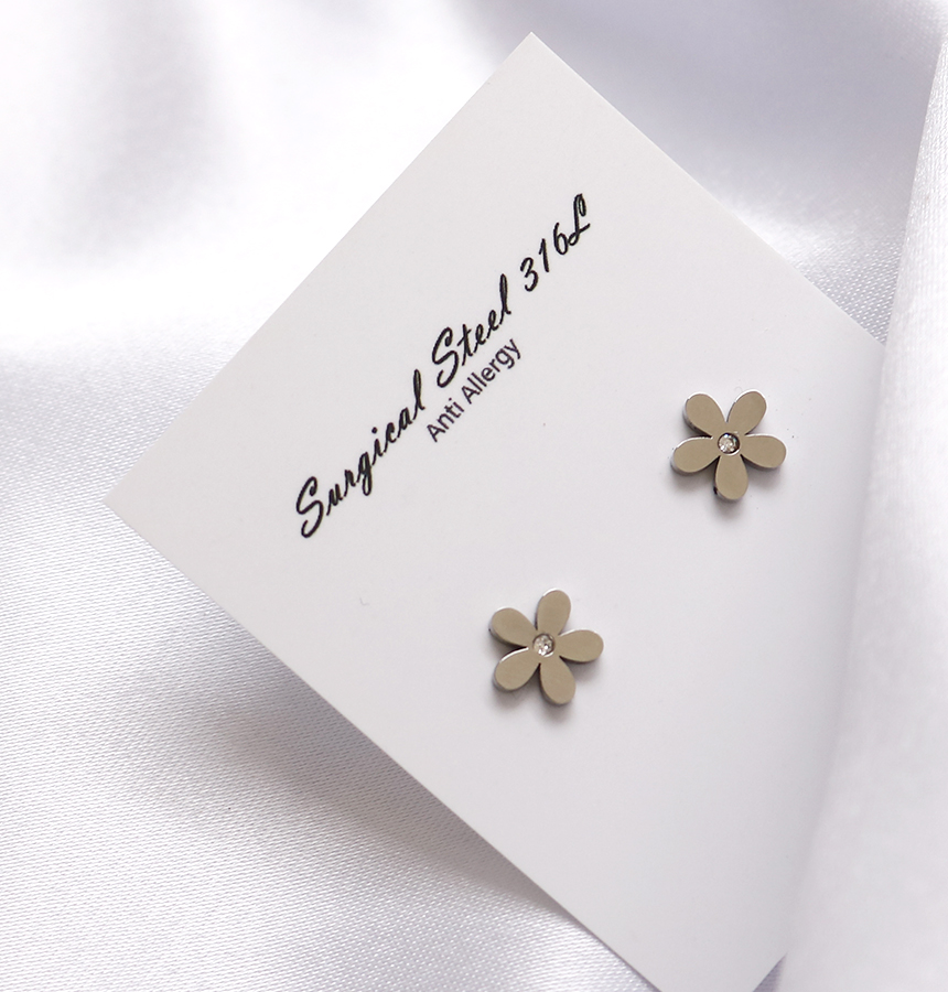 Pearl flower surprise steel earrings titanium stai