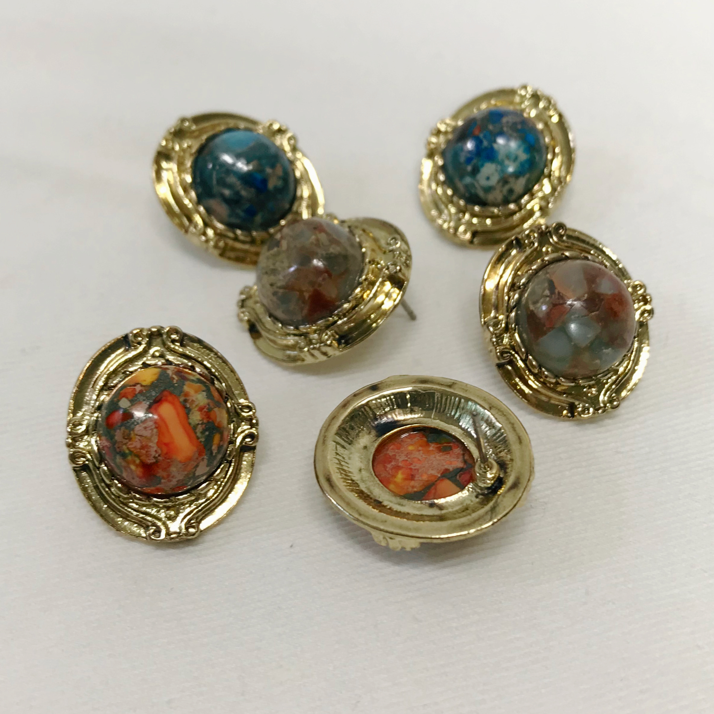 Hamaica earrings titanium spikes antique stone bol