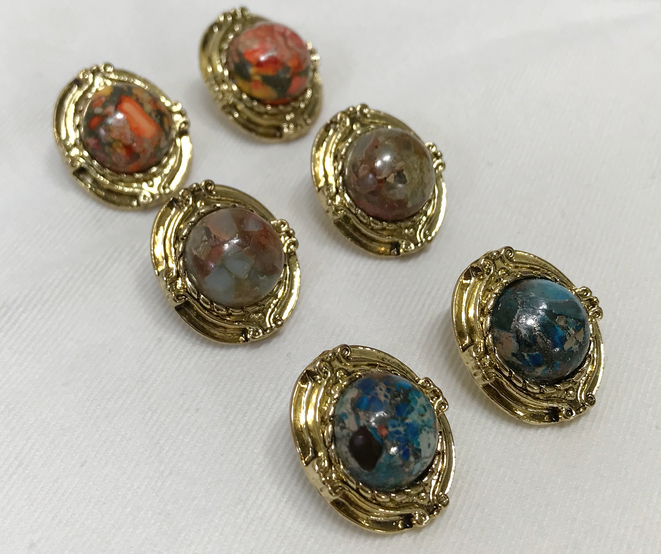 Hamaica earrings titanium spikes antique stone bol