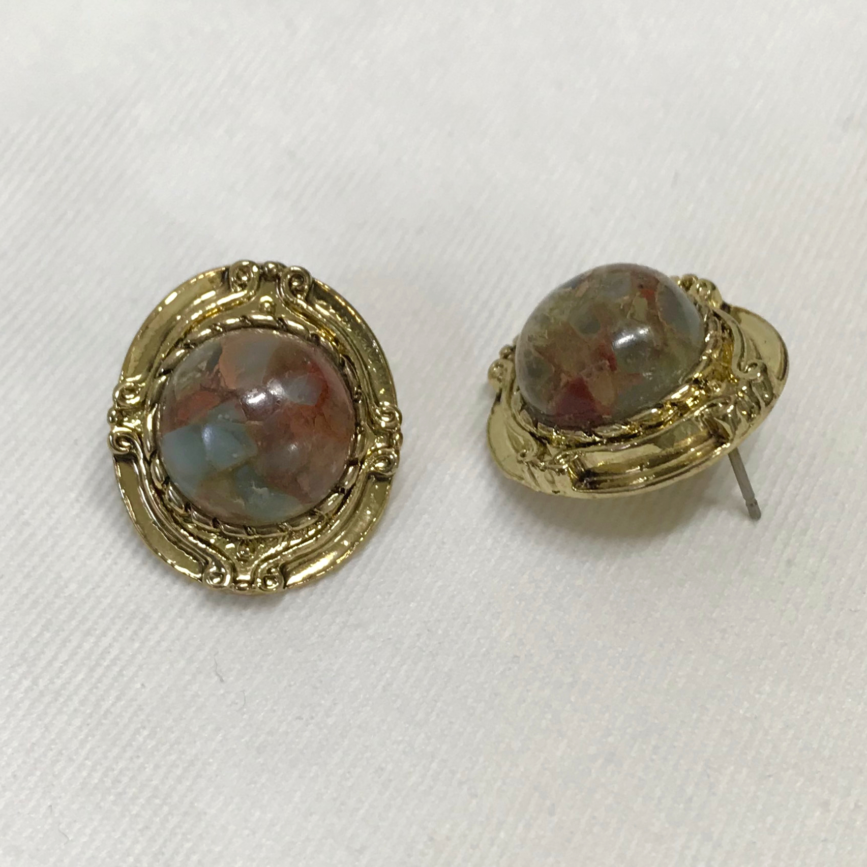 Hamaica earrings titanium spikes antique stone bol