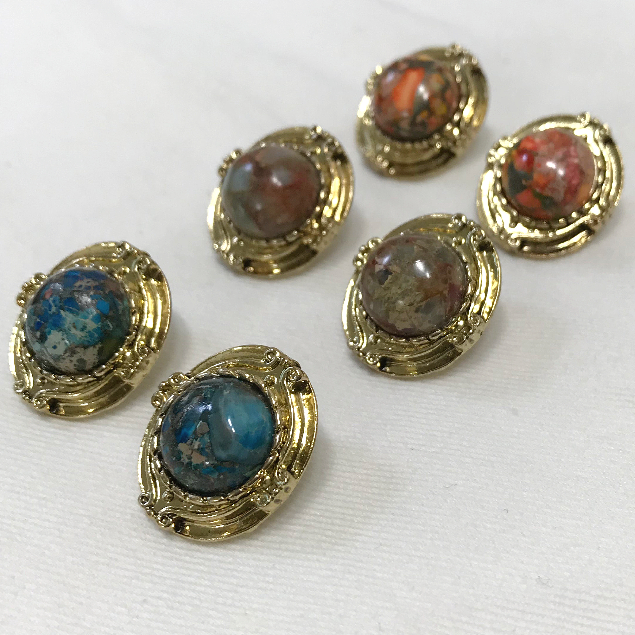 Hamaica earrings titanium spikes antique stone bol