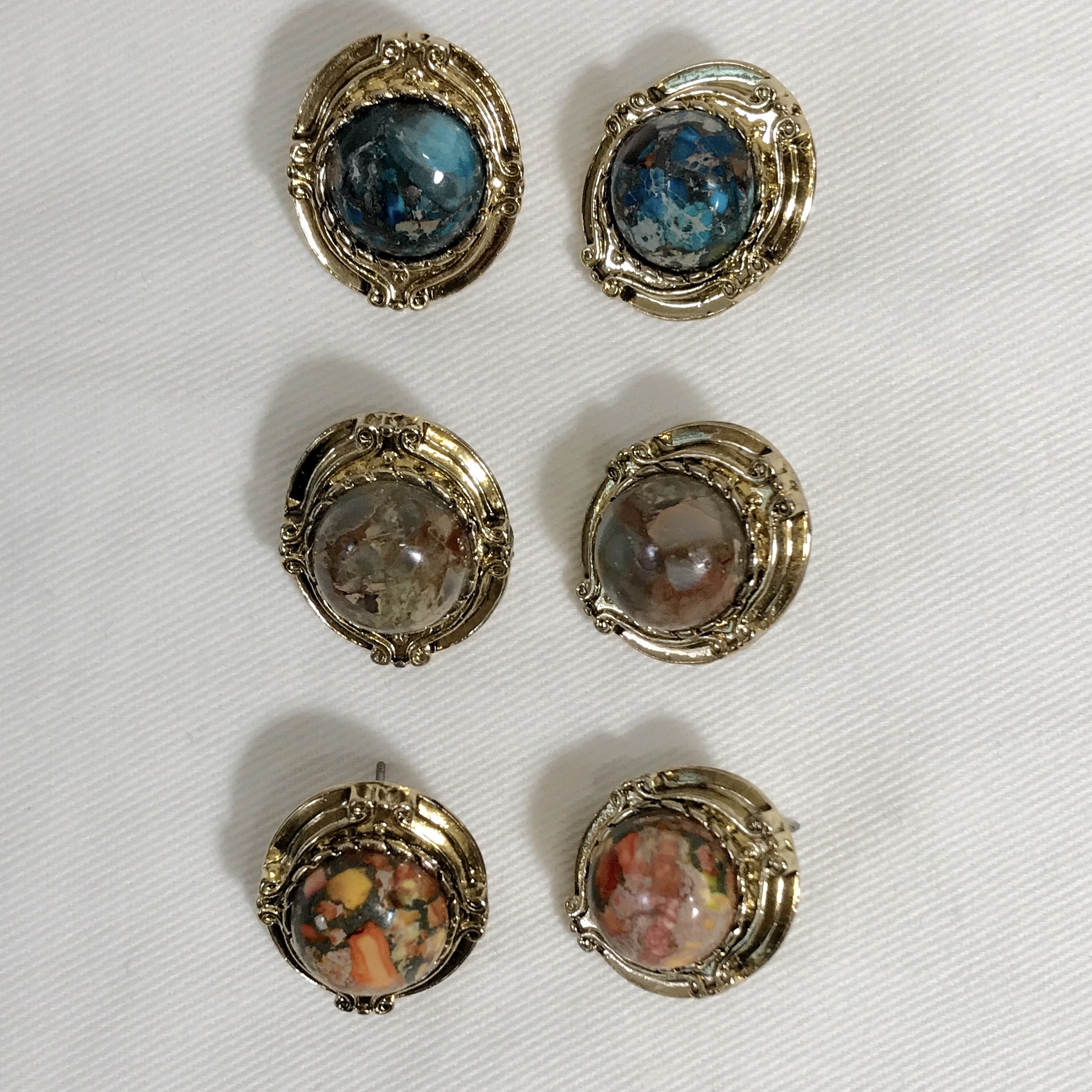 Hamaica earrings titanium spikes antique stone bol