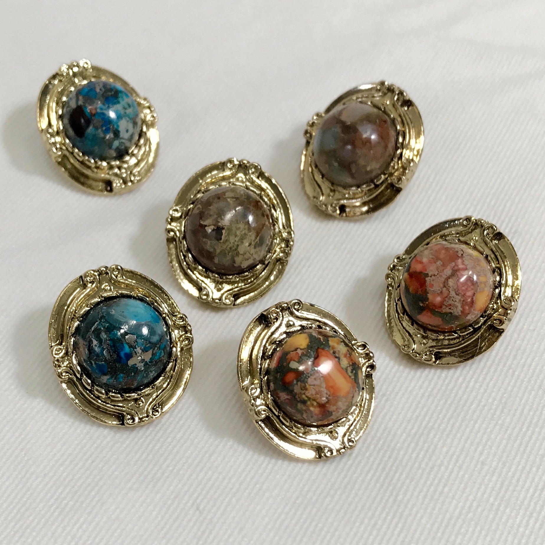 Hamaica earrings titanium spikes antique stone bol