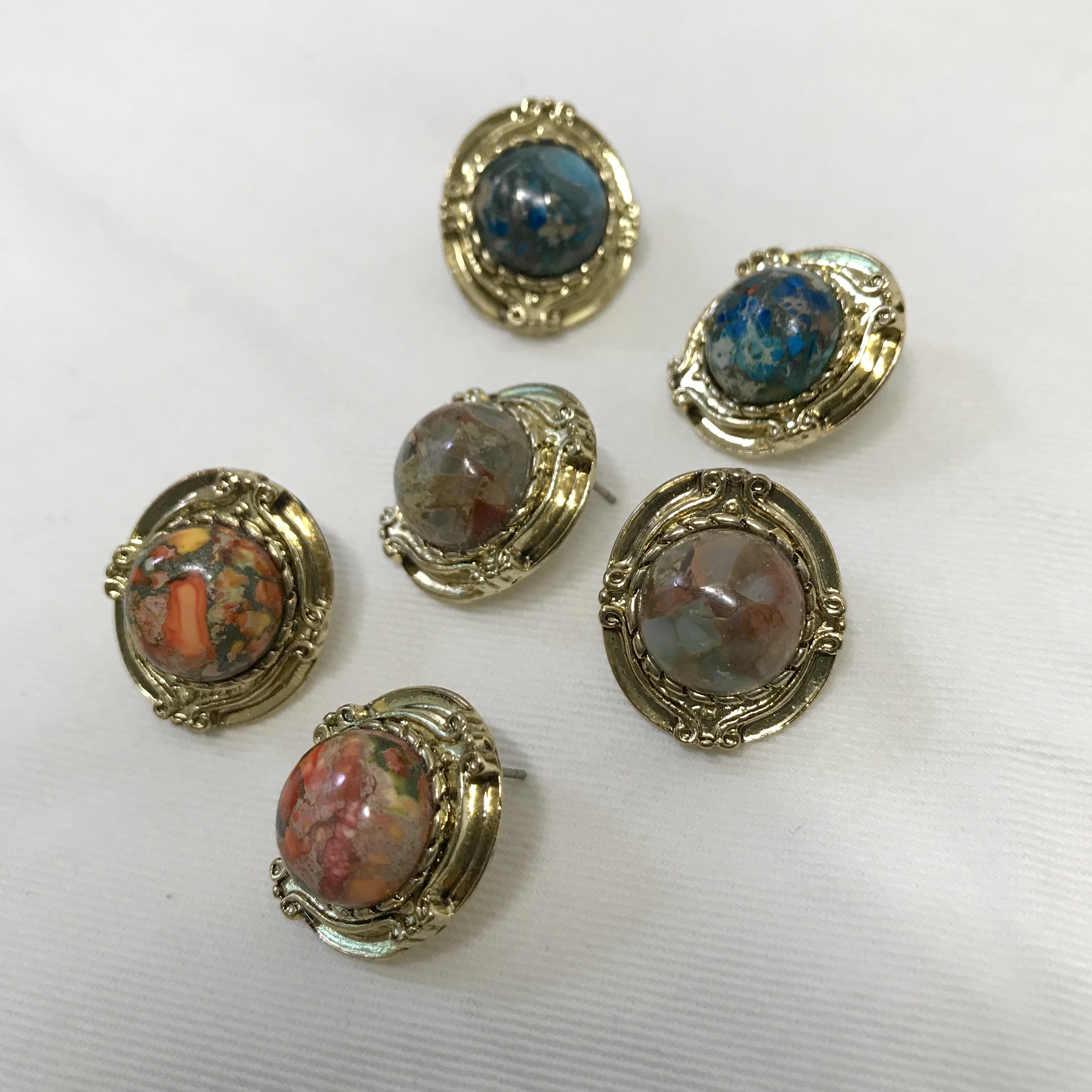 Hamaica earrings titanium spikes antique stone bol