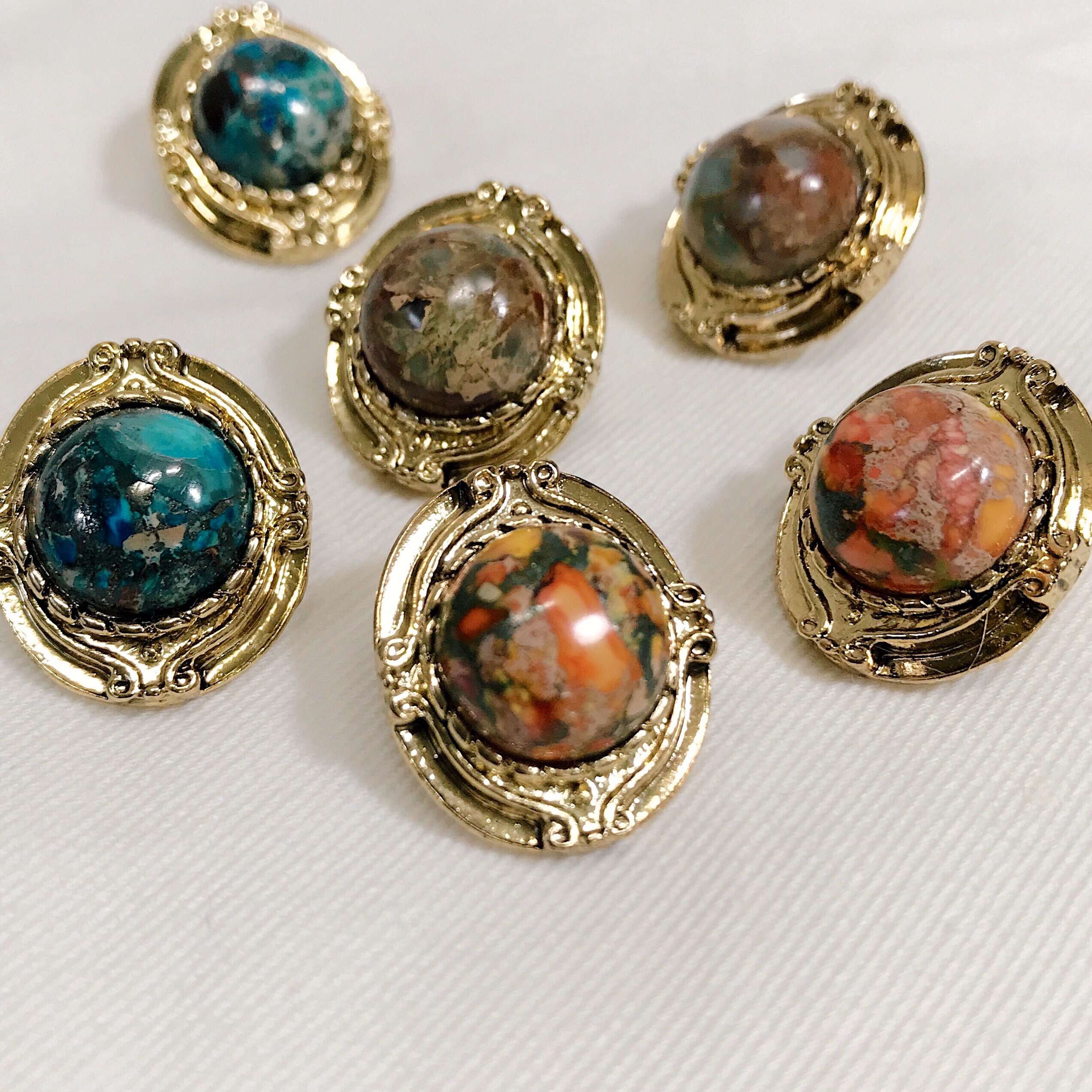 Hamaica earrings titanium spikes antique stone bol