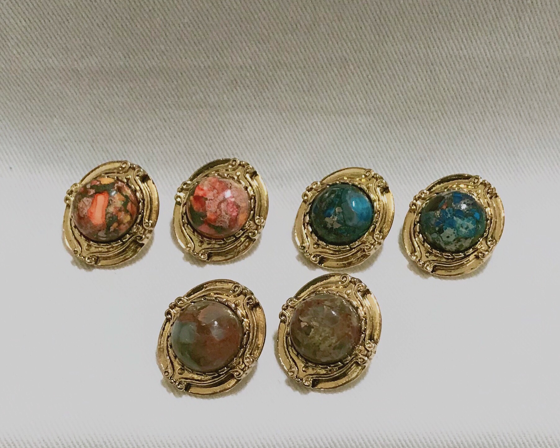 Hamaica earrings titanium spikes antique stone bol