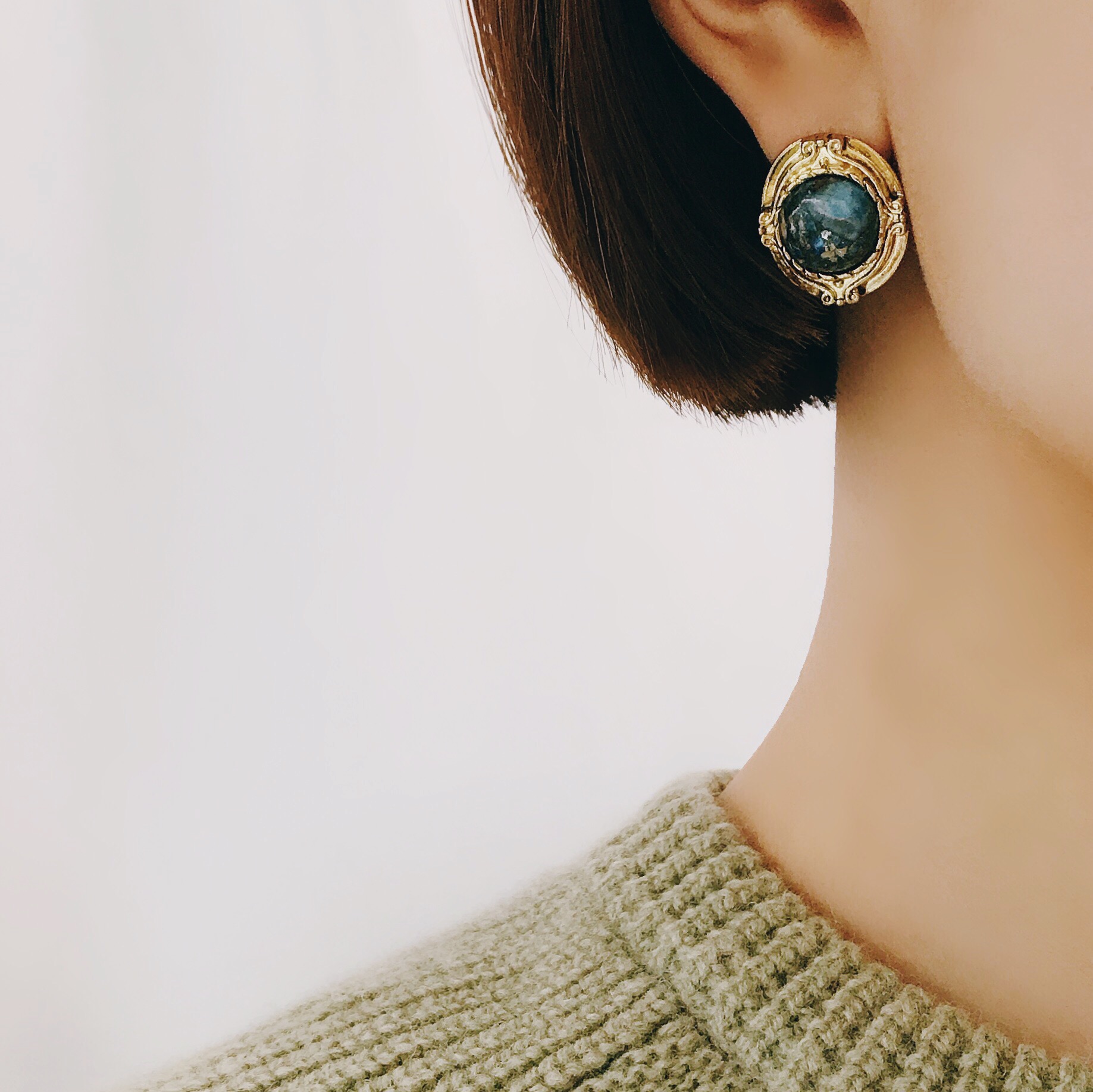 Hamaica earrings titanium spikes antique stone bol