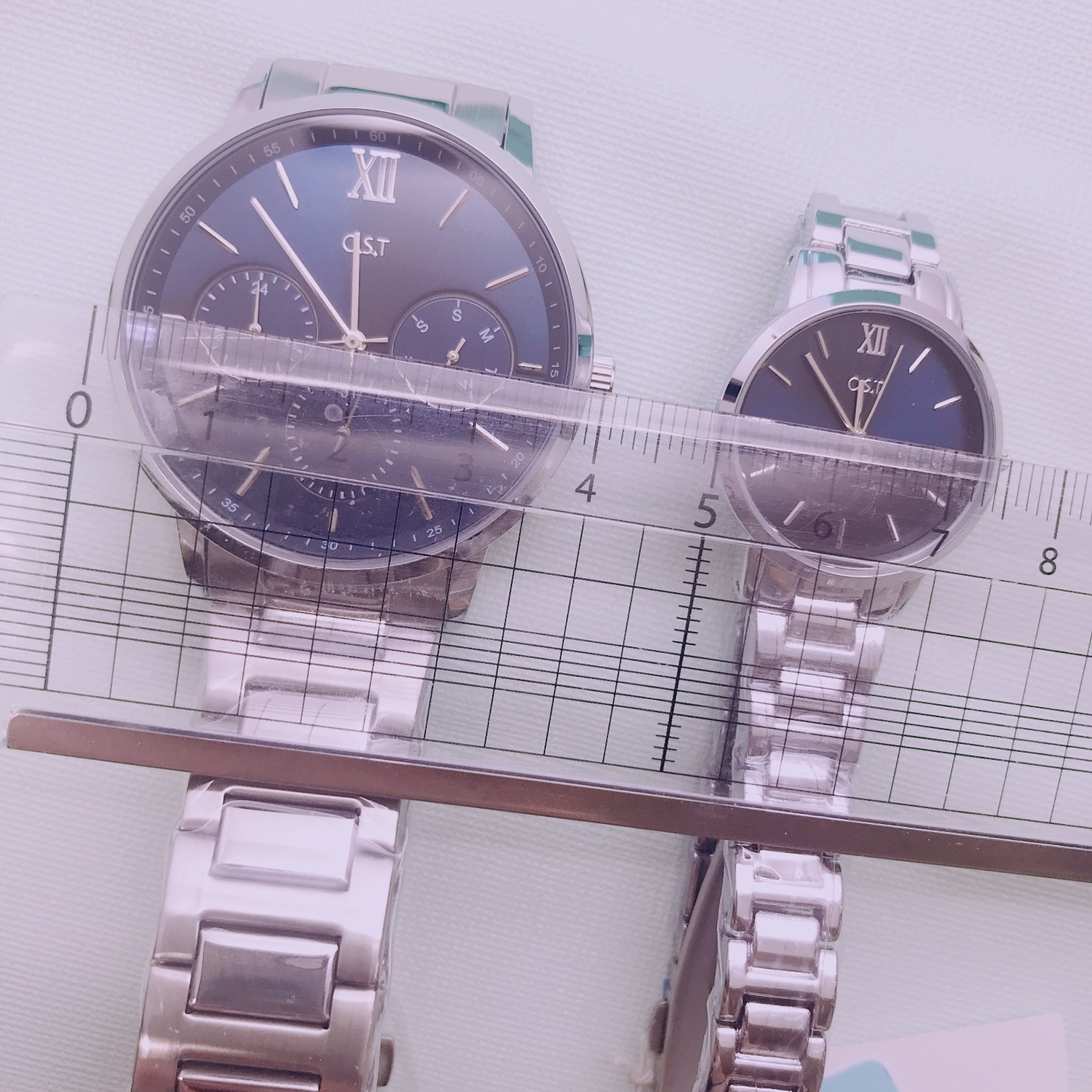 <b><p>OST Parase Couple Metal Watch Navy OTC118205FLS</p></b><b><p>OSTパラダイスカップルメタル時計 ネイビー OTC118205FLS 25T 男</p></b><br /><br /><p align='center'>