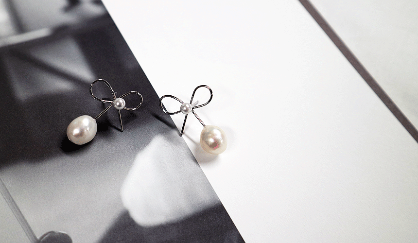 <b><p>earring Freshwater pl bbon Butiful Beloved</p></b><b><p>イヤリング 淡水真珠 リボン 光沢がきれいな 愛らしい デートルック センスあふれる</p></b><br /><br /><p align='center'>