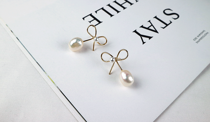 <b><p>earring Freshwater pl bbon Butiful Beloved</p></b><b><p>イヤリング 淡水真珠 リボン 光沢がきれいな 愛らしい デートルック センスあふれる</p></b><br /><br /><p align='center'>