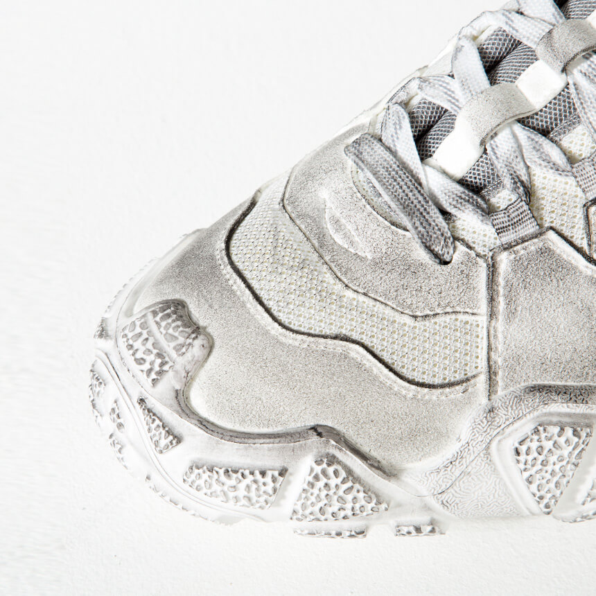 Stained white ugly sneakers