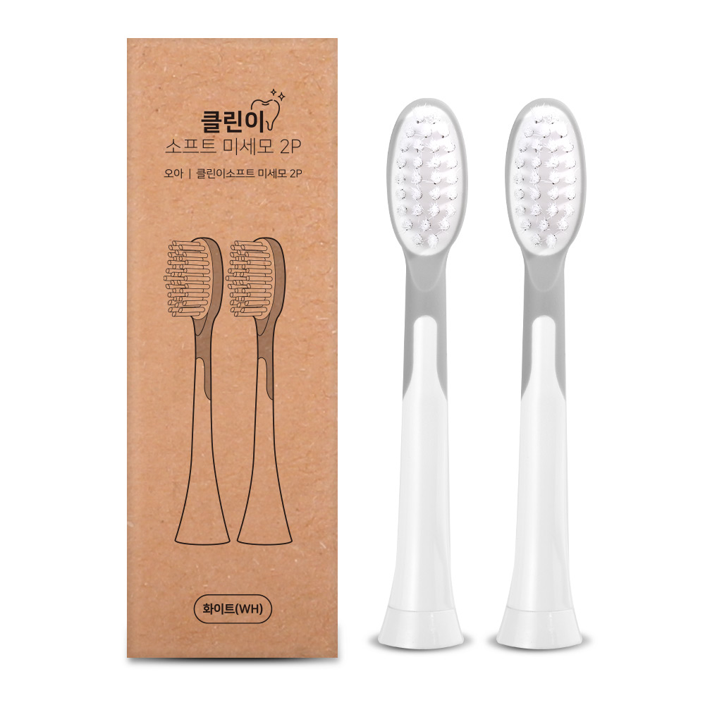 클린이 브랜드 로고가 있는 크래프트 박스와 흰색 계열 칫솔모 2개가 함께 전시된 제품 구성 이미지
