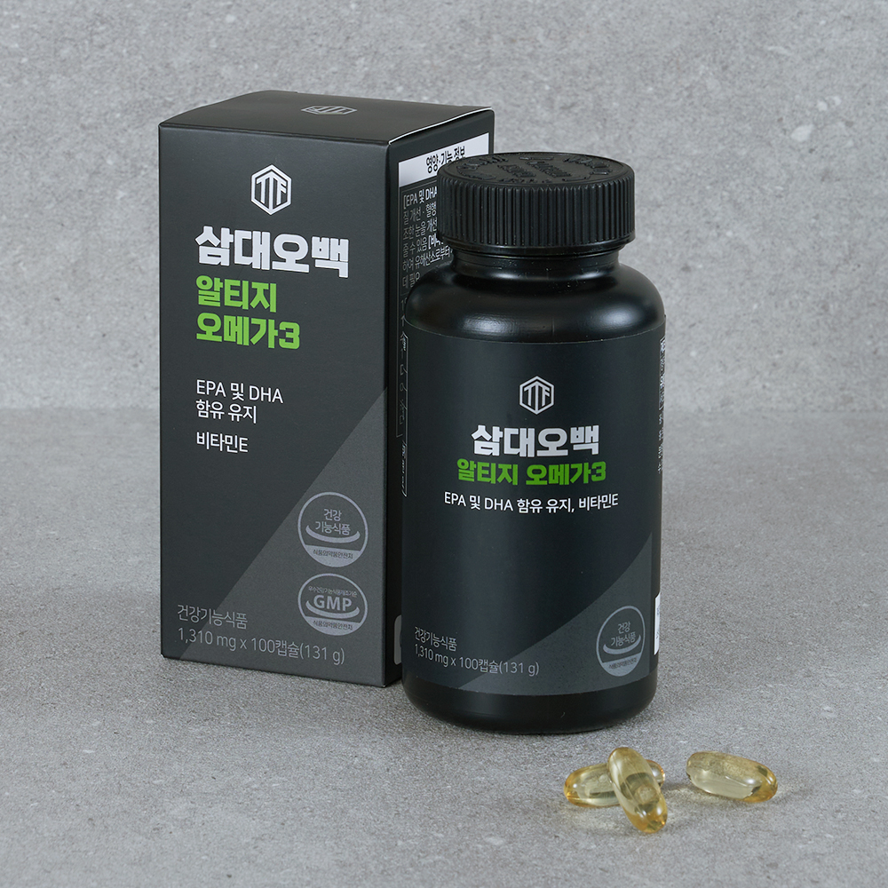 회색 바닥에 검은색 병과 상자가 놓여있고 앞쪽에 노란색 캡슐 3개가 흩어져 있는 제품 구성도