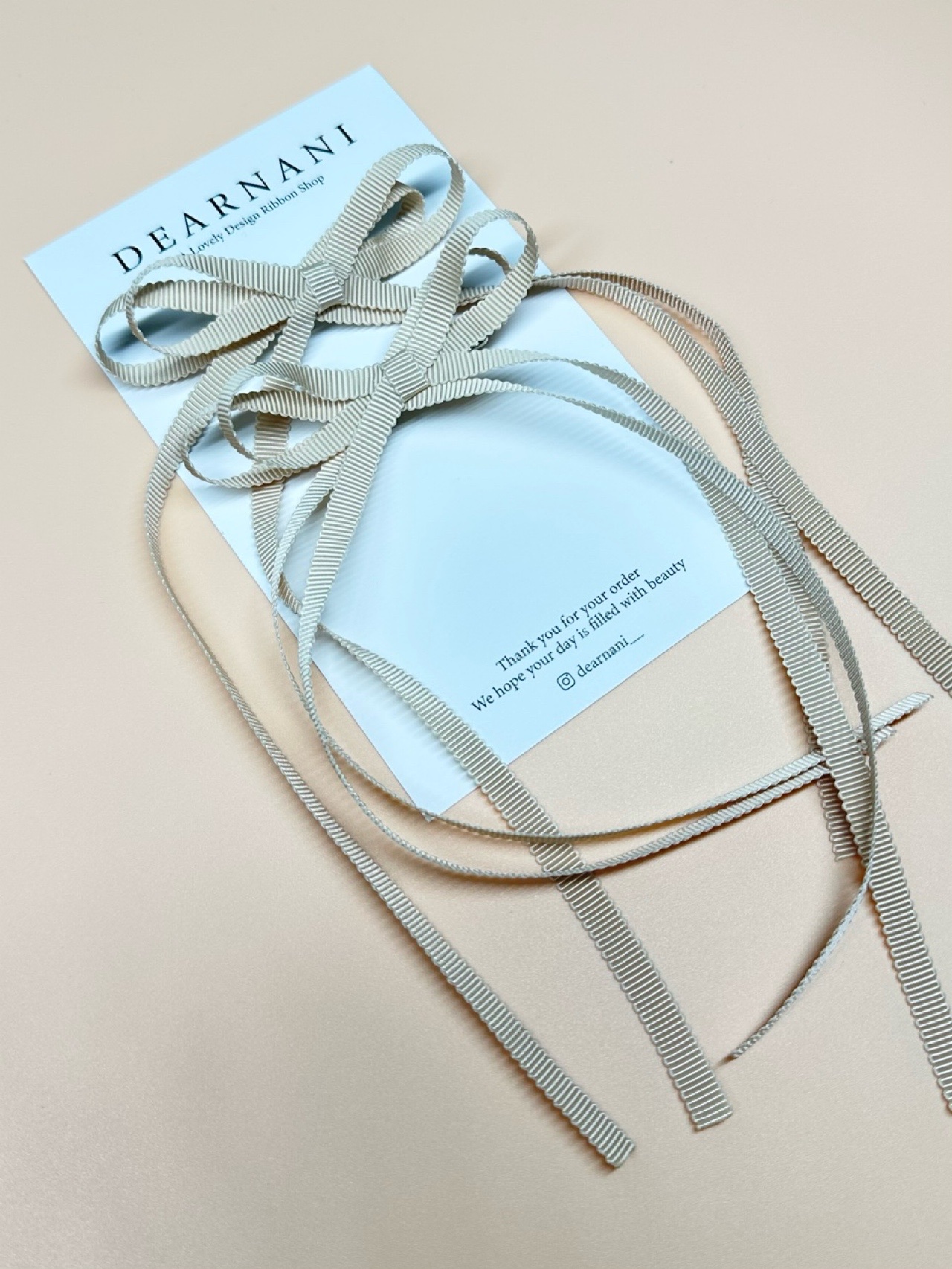 [디얼나니] Double Petite bow pin (beige) - 상품 이미지