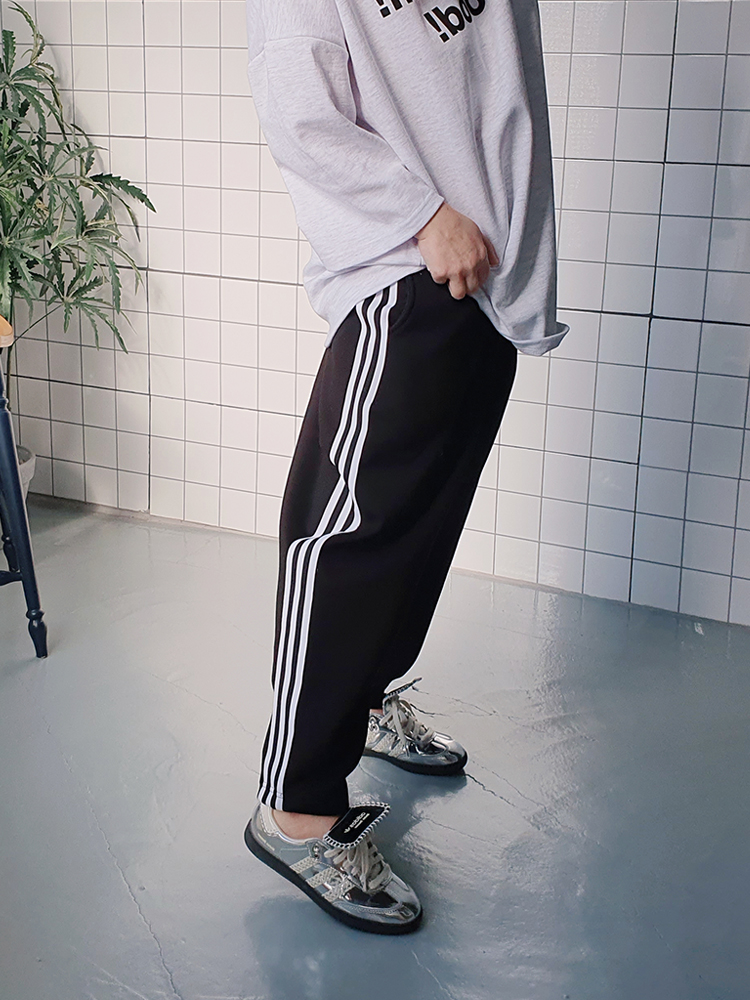 기모 남녀공용 와이드한 트레이닝 배기바지 - 상품 이미지
