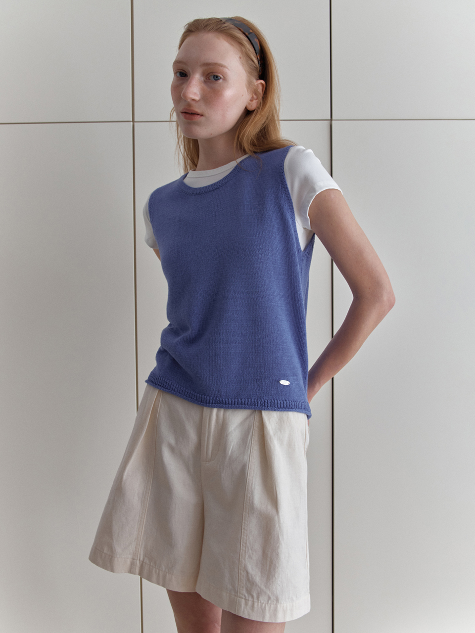 [엘씨브이] DIAGONAL BUTTONS SLEEVELESS KNIT_BLUE - 상품 이미지