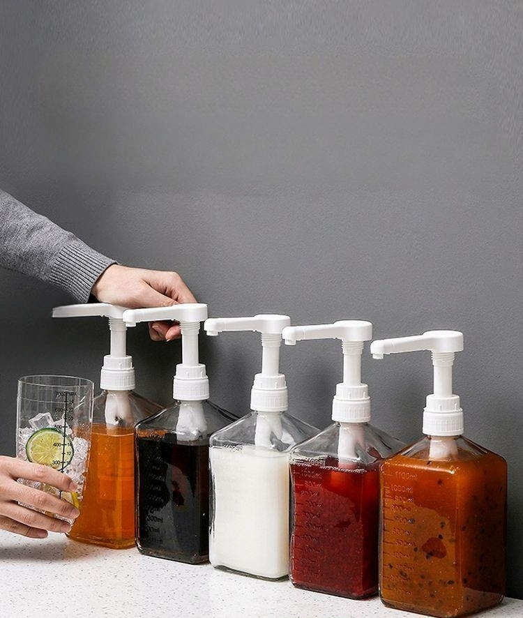 카페 시럽 디스펜서 소스통 밀폐 거치대 보관통 액체 30ml 패션프루트 1100ml 포함 - 상품 이미지