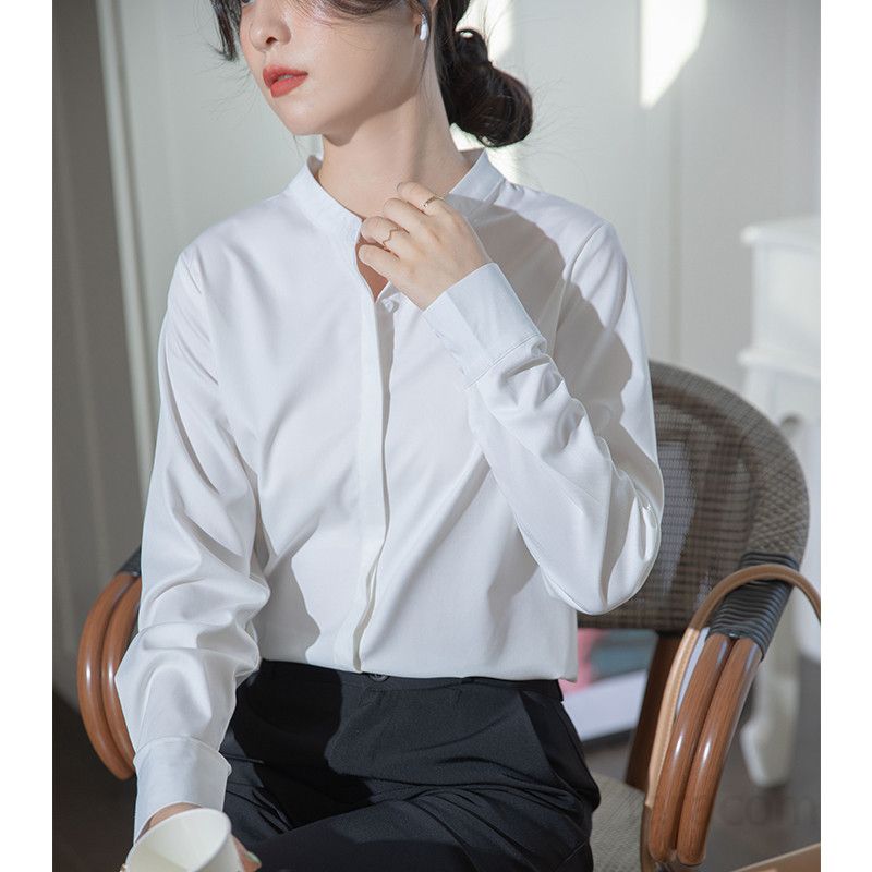 화이트 여성 셔츠 스탠드 칼라 느슨한 핏 여름 데일리 블라우스 편안한 착용감 캐주얼 스타일 오피스룩 플래킷 디테일 시원한 소재 - 상세 이미지 3