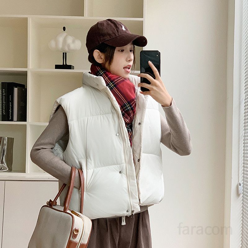 여성 경량 패딩 조끼 가을 신상 캐주얼한 스타일의 숏 디자인 데일리 아웃도어 활용 가능 편안한 착용감 트렌디한 패션 아이템 - 상세 이미지 2