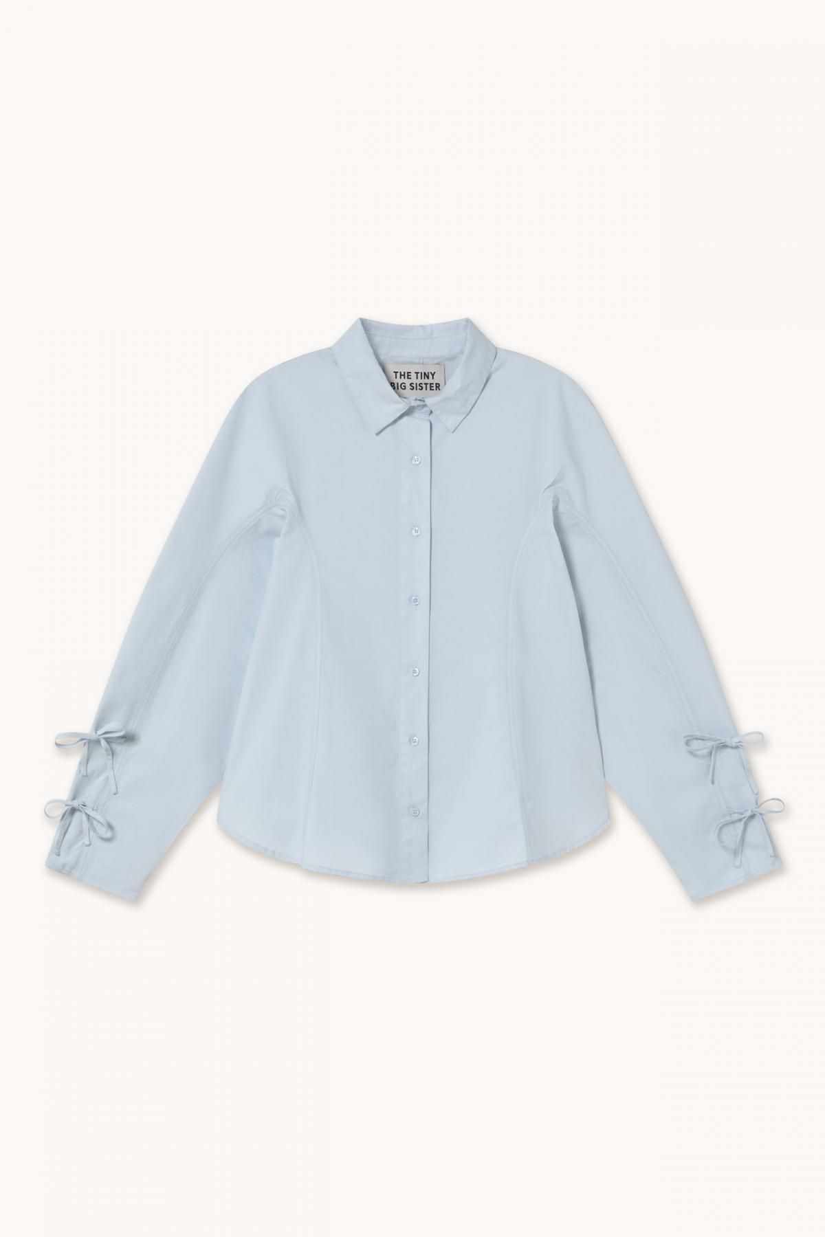 타이니코튼 트렌디 리본 포인트 파스텔 블루 블라우스 AW25-800J24 ONE COLOR - 메인 이미지