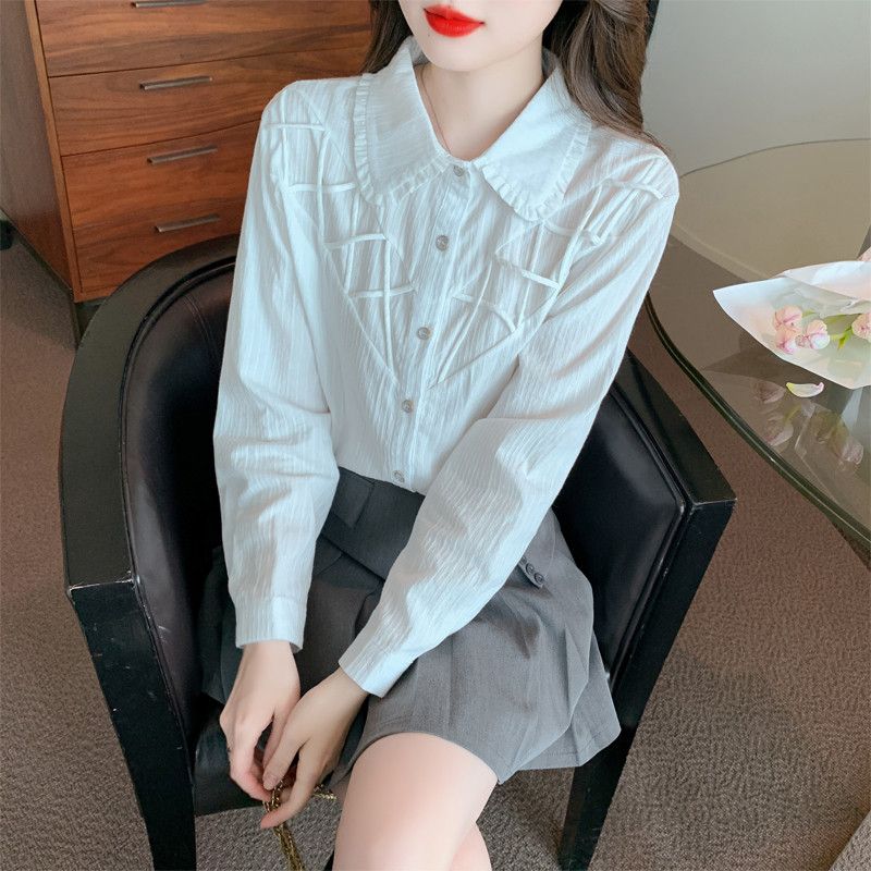 화이트 긴팔 블라우스 여성 가을 스타일리쉬 셔츠 디자인 루즈핏 라운드넥 캐주얼한 데일리 상의 편안한 착용감 모던한 분위기 프렌치 무드 - 상품 이미지