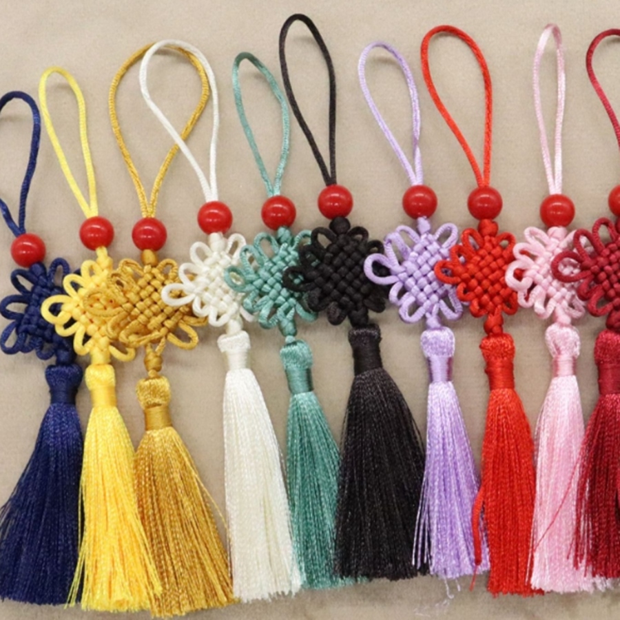 Mini knot-tied hair ornament, traditional surgical instrument decoration, packaging.
