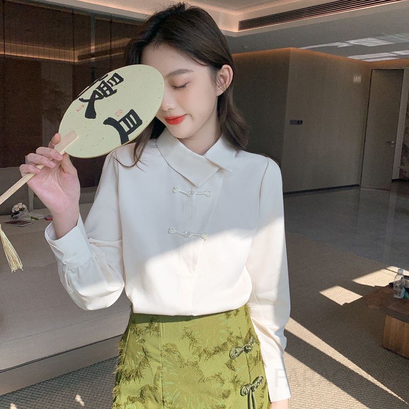 가을 여성 복고풍 블라우스 루즈핏 단추 디테일 긴팔 캐주얼 셔츠 빈티지 스타일 데일리 상의 편안한 착용감 모던한 디자인 - 상품 이미지