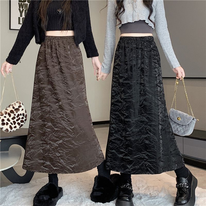 가을 여성 A라인 가죽 스커트 탄력 허리 중간 길이 편안한 착용감 데일리 스타일리시한 외출용 캐주얼룩으로 적합한 미디 - 메인 이미지