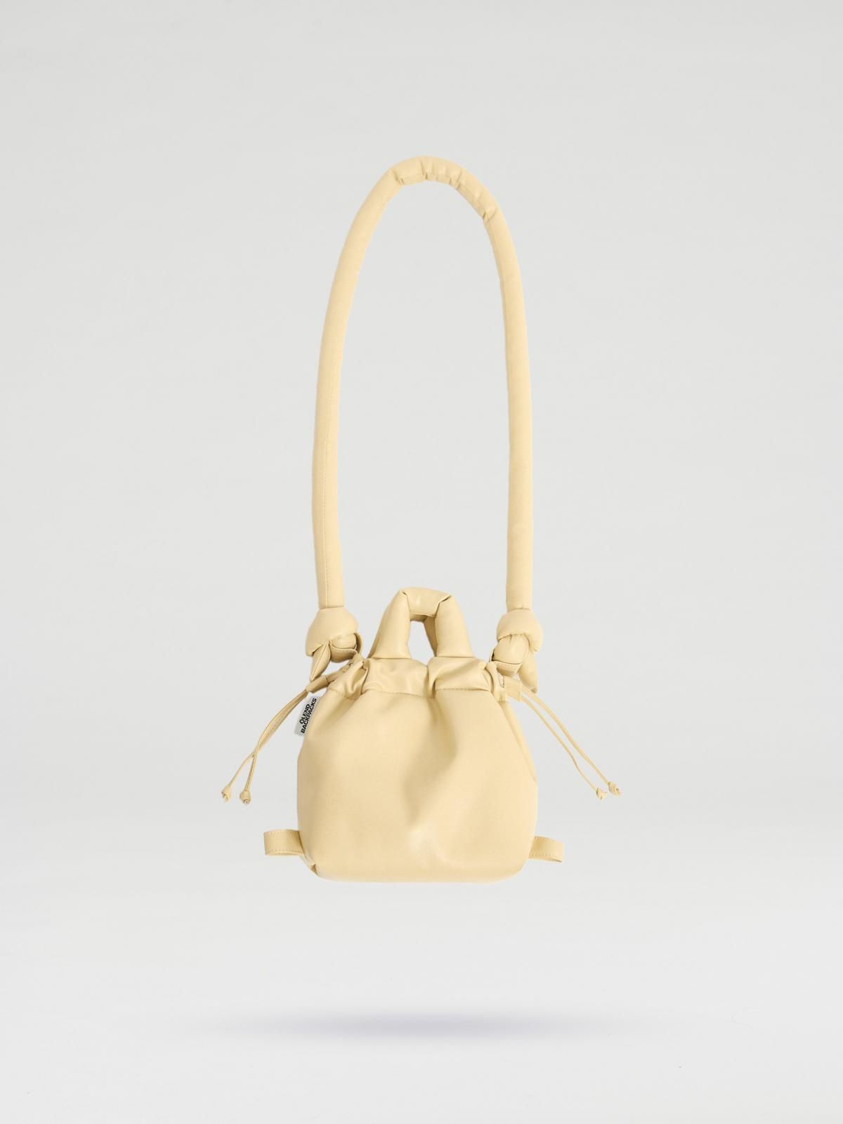 올랜드 미니멀 소프트 비건레더 마이크로 버킷백 49018951074127 BUTTER YELLOW - 메인 이미지