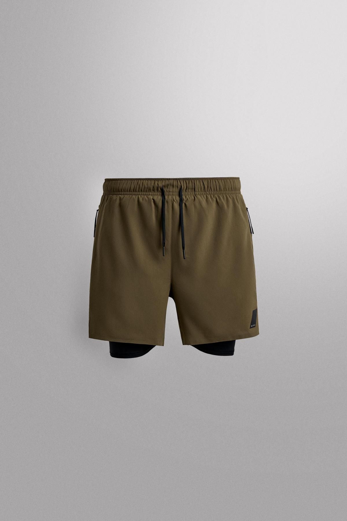 자라 테크니컬 스트레치 2IN1 트레이닝 쇼츠 1943/320 DARK KHAKI - 메인 이미지
