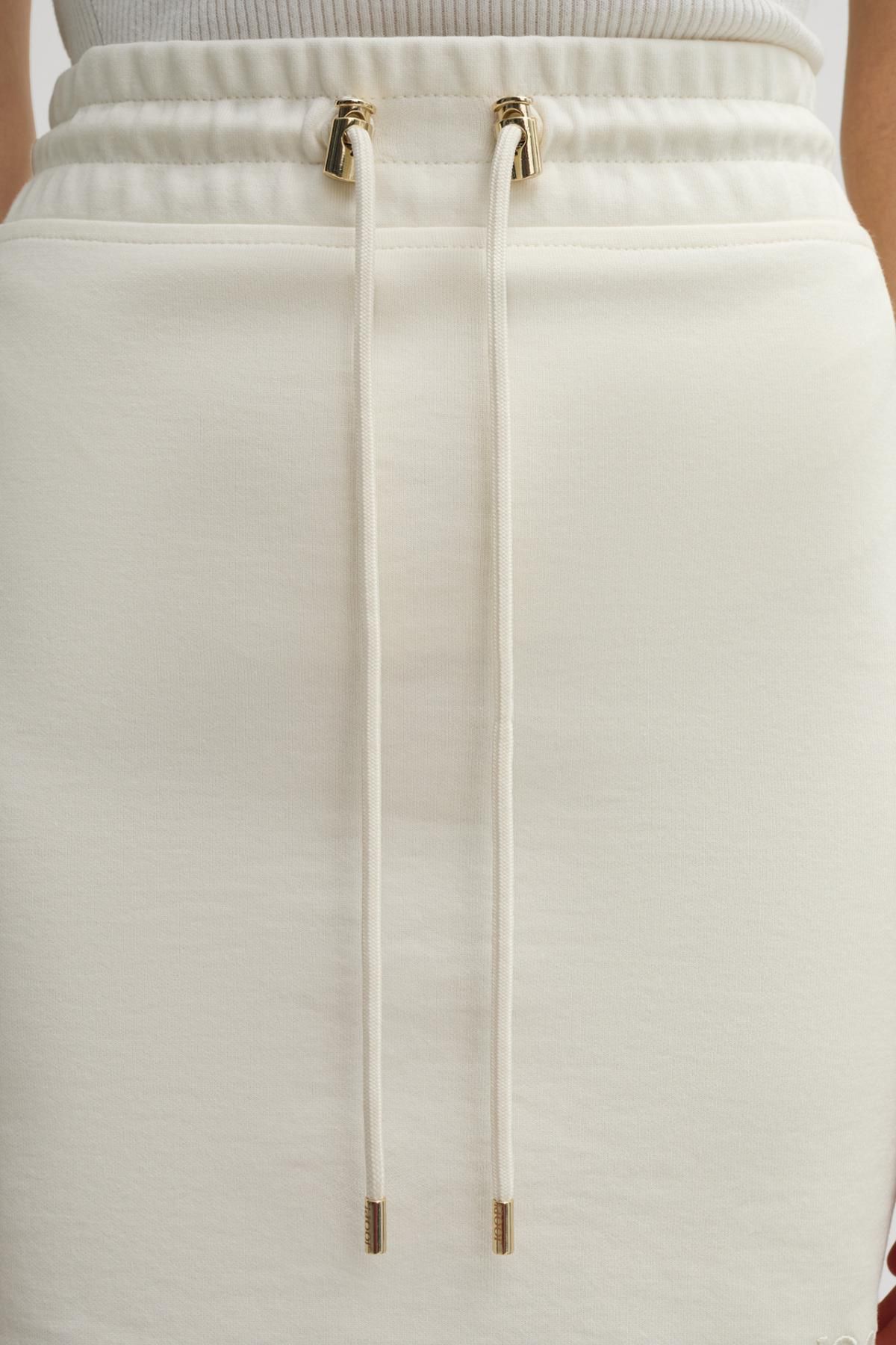 윱 모노크롬 코튼저지 미디 스커트 티아라 크림 30046242-10007096-102 OFFWHITE - 상세 이미지 5