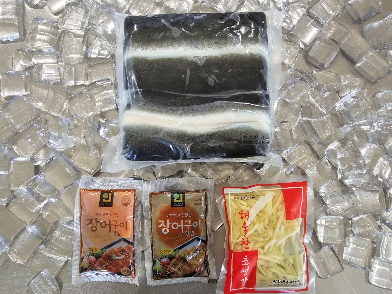 고창 민물장어 2미 손질전 1kg 손질후 700g 내외 소스2종 생강채 동봉 자포니카 - 상품 이미지