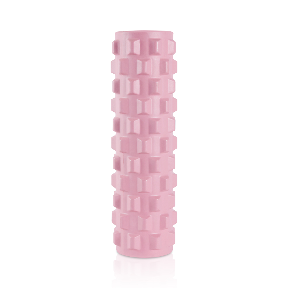 핑크색 돌기 폼롤러를 흰 배경에서 정면으로 촬영한 상품 이미지