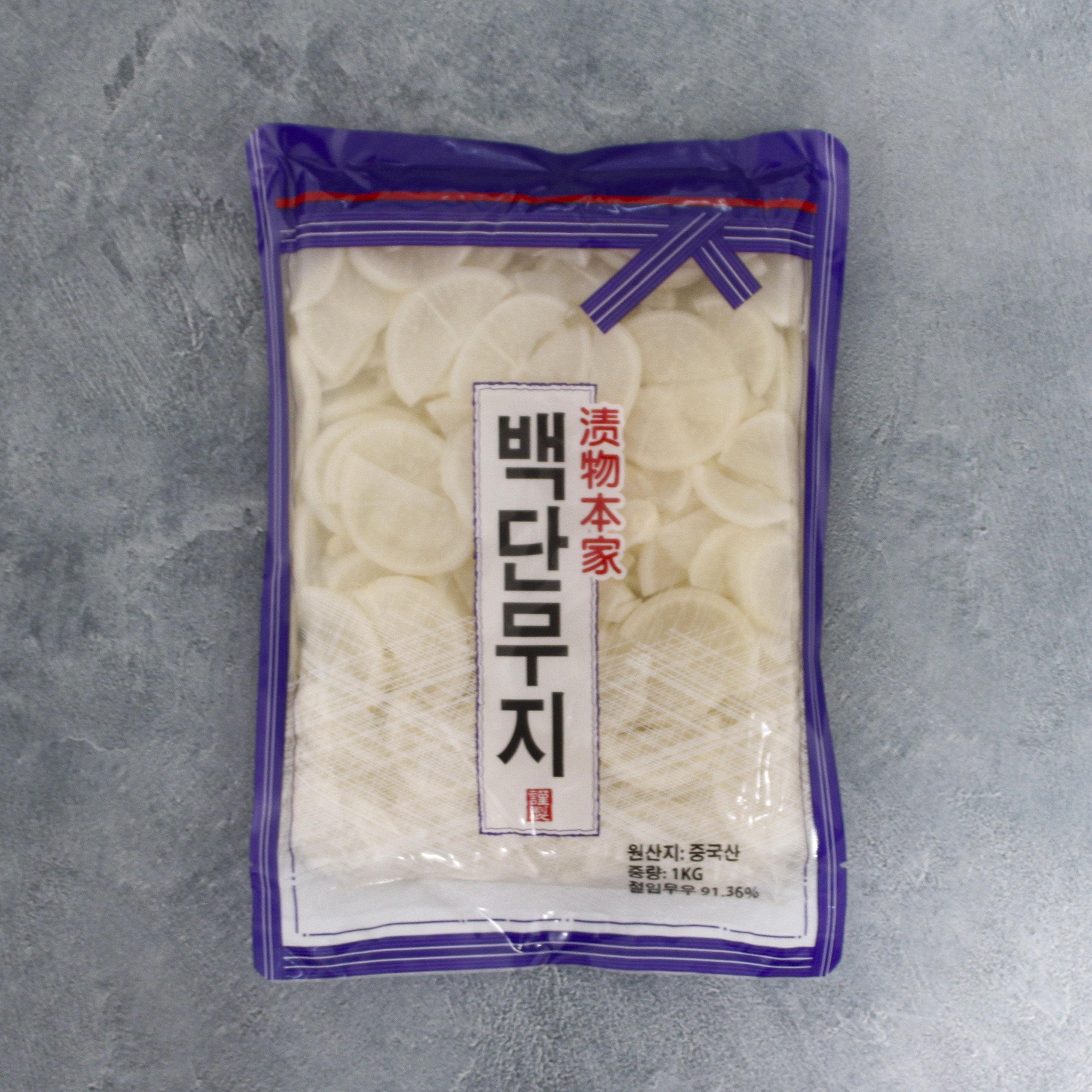 백단무지 슬라이스 1kg 10개 1박스 일식 다꽝 업소용 대용량 반찬 - 상품 이미지