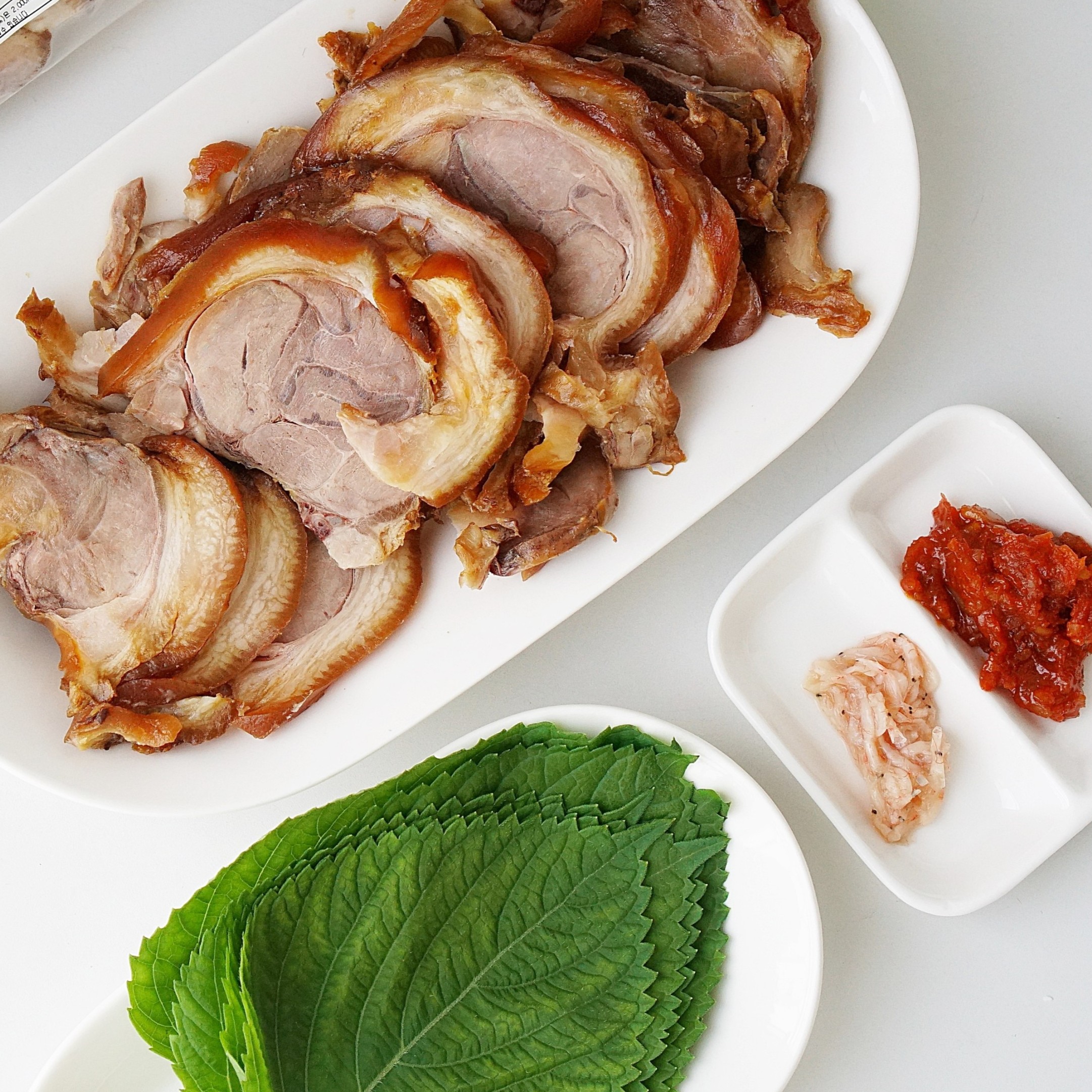 삼형제고기 흑마늘 순살 족발 250g 1팩 제로당 돼지 슬라이스 무뼈 상품 이미지