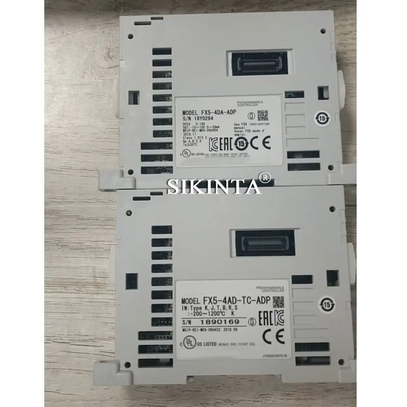 FX5-4AD-ADP PLC 확장 모듈 완전히 리퍼