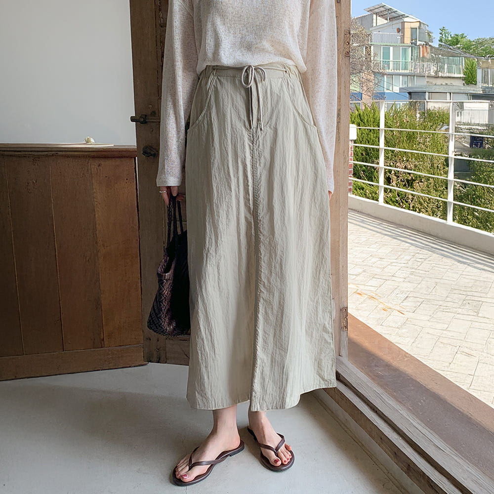 10가트 리우 아노락 나일론 밴딩 롱 스커트 SK038