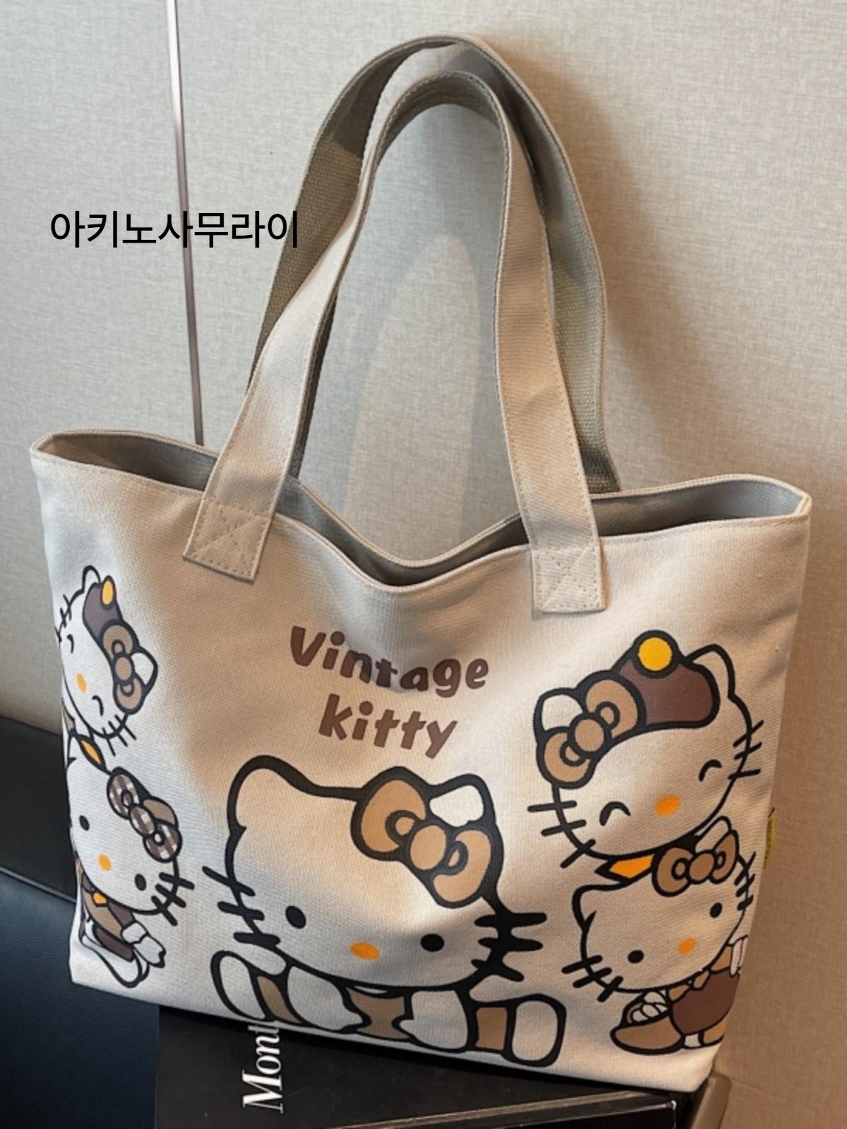 헬로키티 여성 대용량 캔버스 숄더백 토트백 출퇴근 단기여행 가방 에코백 아키노사무라이 오프화이트 - 상세 이미지 2
