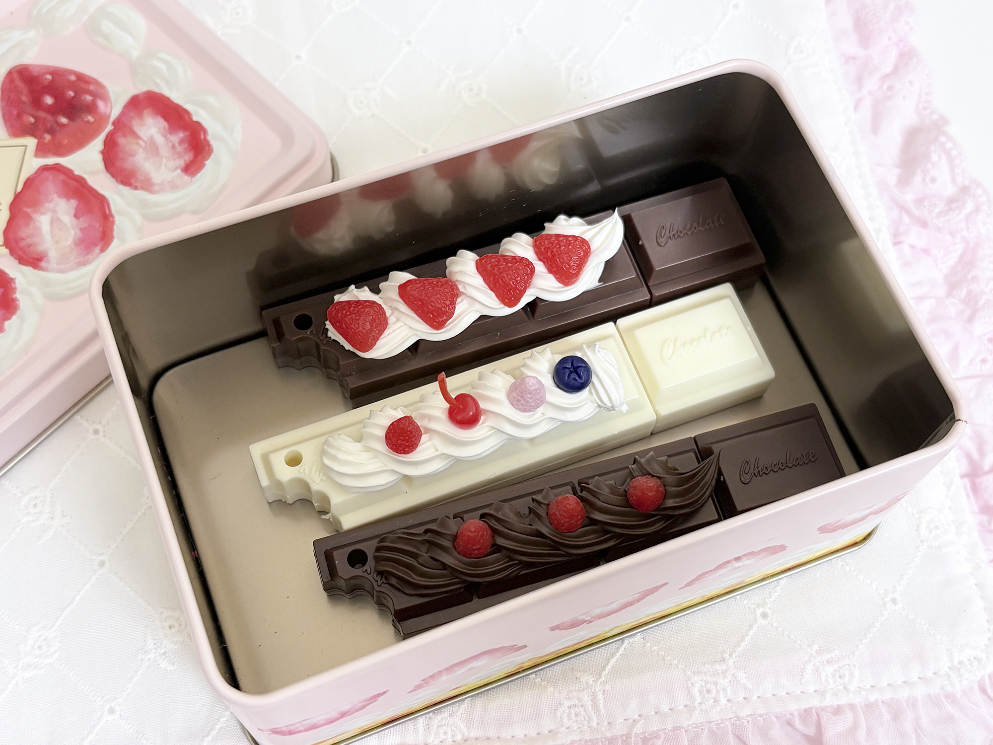 Chocolate-themed keychain with whipped cream decoration
